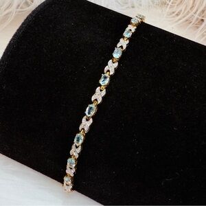 Vintage HAN 925 Aged goldtone, blue topaz linked bracelet